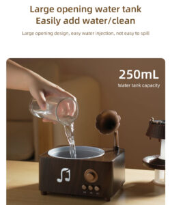 Yminigo V98 gramophone aroma diffuser 250ml with water being poured into tank