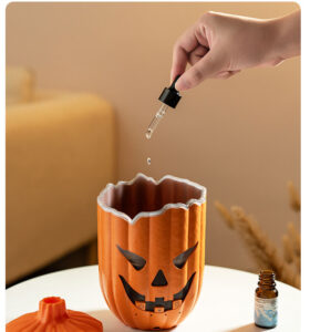Yminigo V86 pumpkin aroma diffuser with essential oil being added