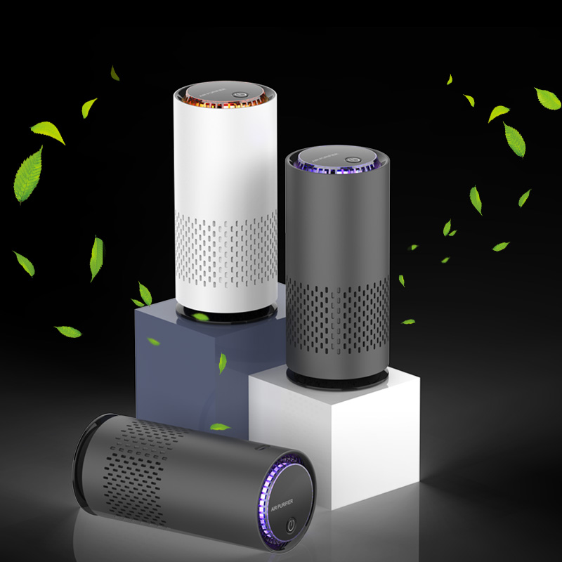 Yminigo portable car air purifier 45-degree view with cup holder design