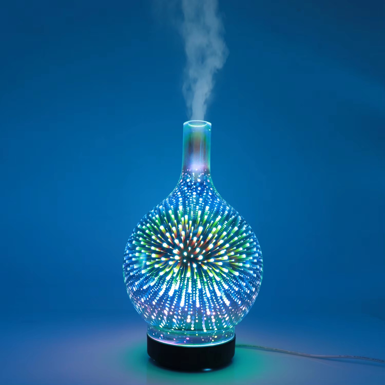 Yminigo glass aroma humidifier emitting mist with a colorful 3D firework light projection