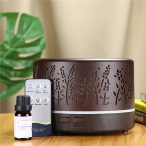 Yminigo dark wood grain botanical humidifier with a wireless remote control and essential oil bottle